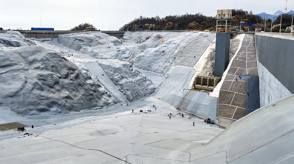 Large reservoir concrete surface with polyurea waterproofing protection
